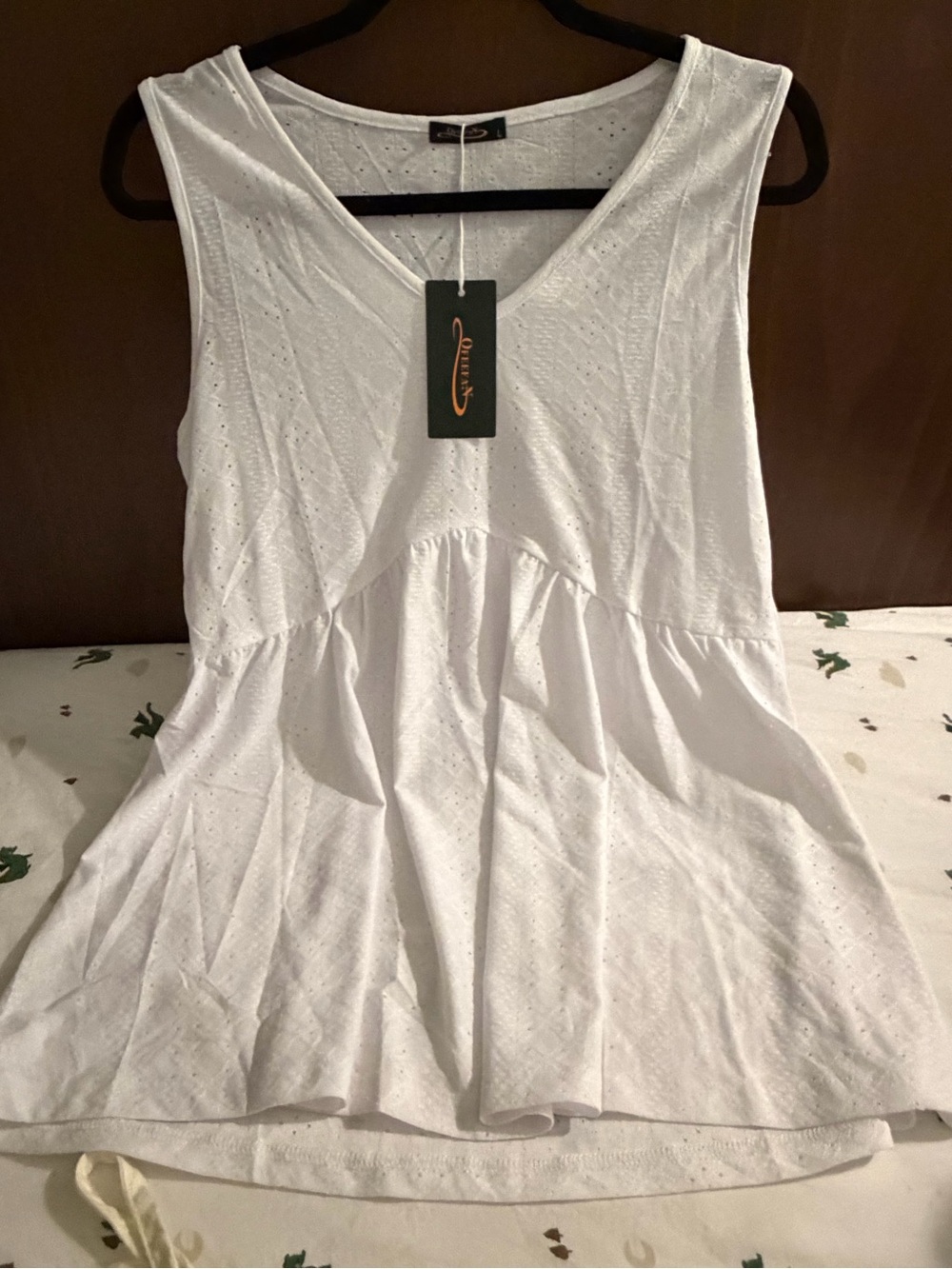 Maternity Sleeveless Eyelet Peplum Top